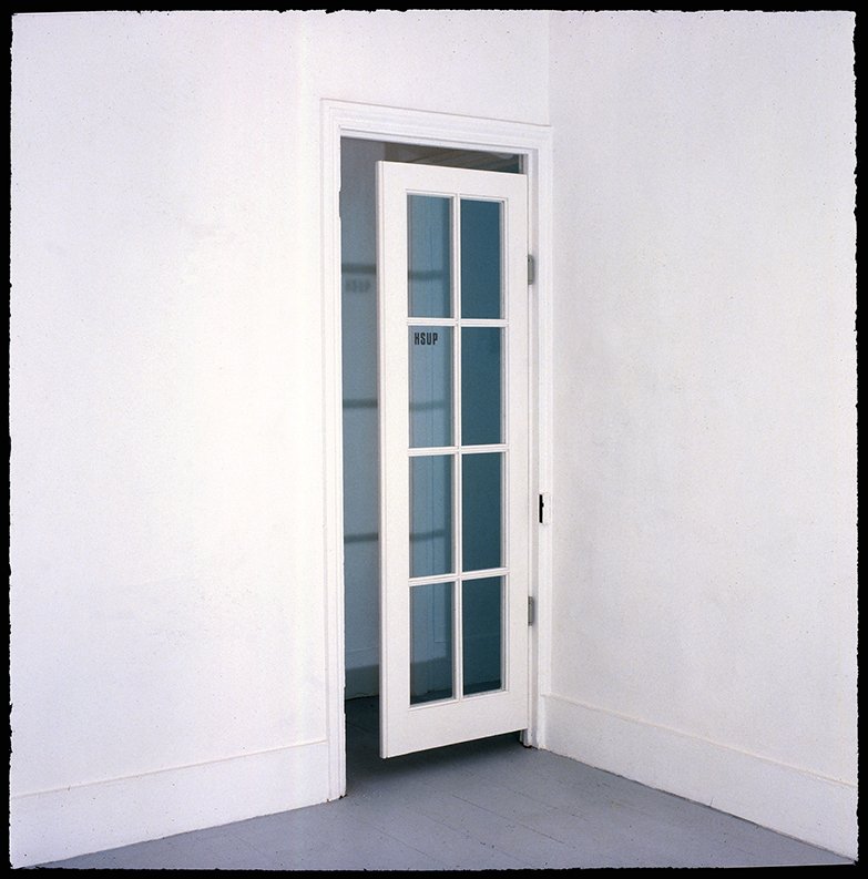 Paradoxical 'PUSH' sign on double swing door